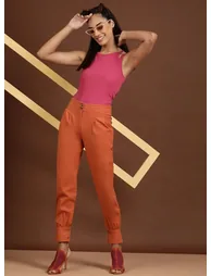 Women Orange Tapered Fit Solid Pants