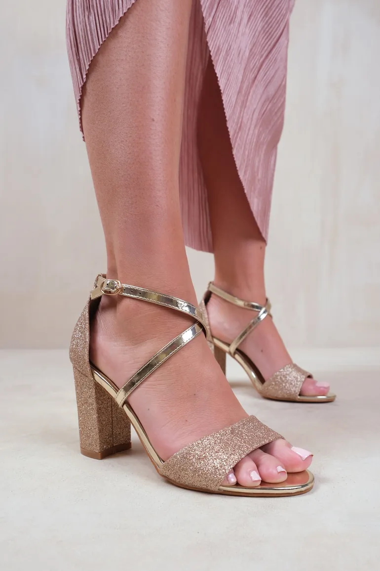 RUTH WIDE FIT HIGH BLOCK HEEL SANDALS WITH CROSS OVER ANKLE STRAP IN GOLD GLITTER - 1