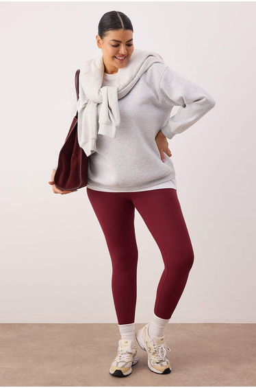 Burgundy soft brushed fabric reflector print detailed full length knitted sports leggings