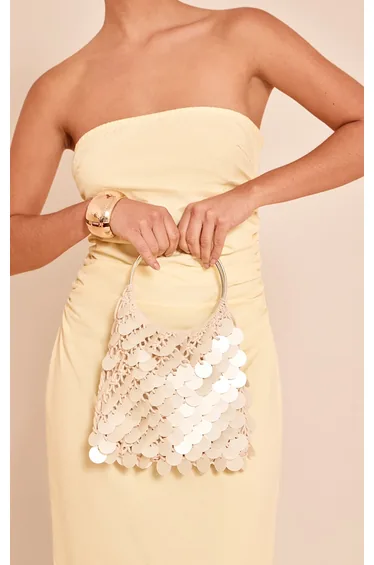 حقيبة يد مزين بالترتر لون كريمي