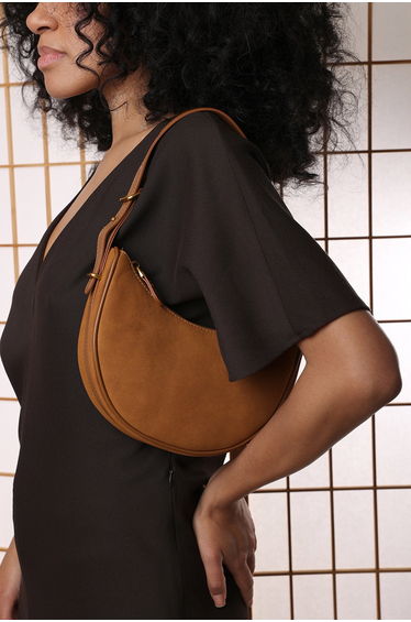 Pebble Modern Half Moon Shoulder Bag In Cognac