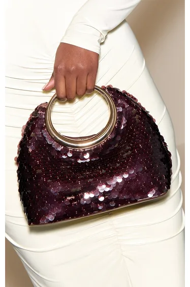 حقيبة كلتش بريتي ليتل ثينق باللون البني