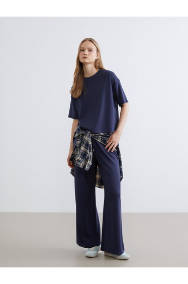 Effortless style meets ultimate comfort in our Soft Touch Oversized Tee.