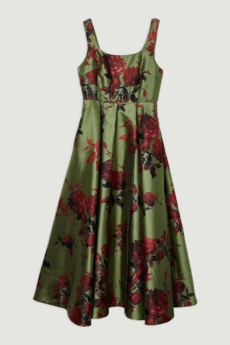 lydia millen floral jacquard corseted woven maxi dress The Textured Floral Midi Dress designed by Lydia Millen. 'A classic floral long-sleeve midi dress is the perfect piece to transition from the colder months to spring. The floral pattern brings a