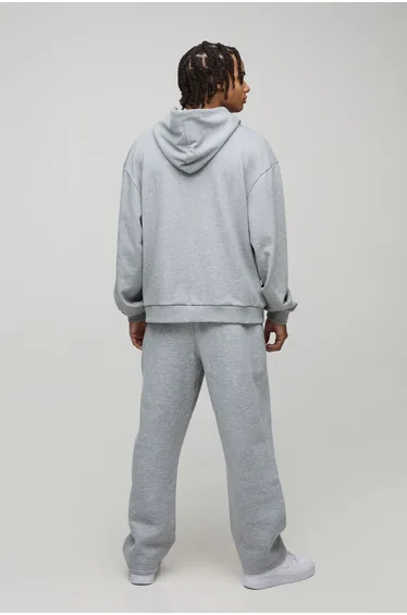 بنطلون رياضي بقصة باغي بطبعة شعار - رمادي