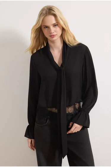 ترينديول بلوزة أسود بأكمام طويلة