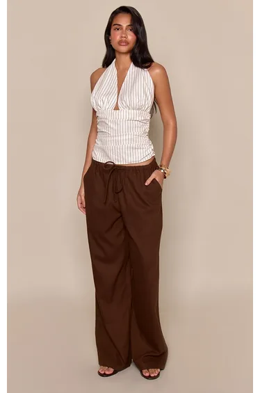 توب بريتي ليتل ثينق بطبعة مخططة بلا أكمام