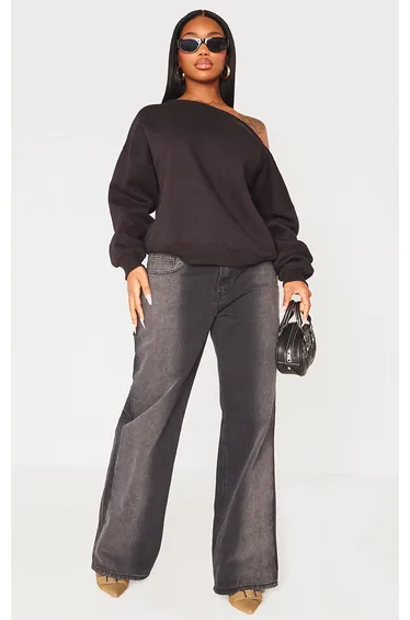 سويتشيرت فضفاض بحواف غير مدروزة