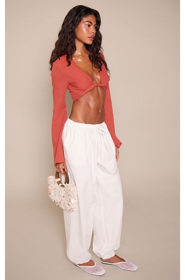 Rust Cheesecloth Twist Plunge Flare Sleeve Top
