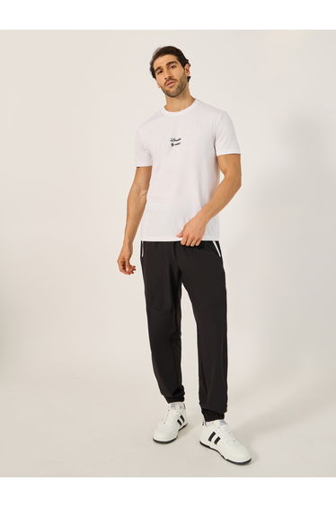 Solid Relaxed Fit Elasticated Cuff Joggers with Contrast Zip detail
