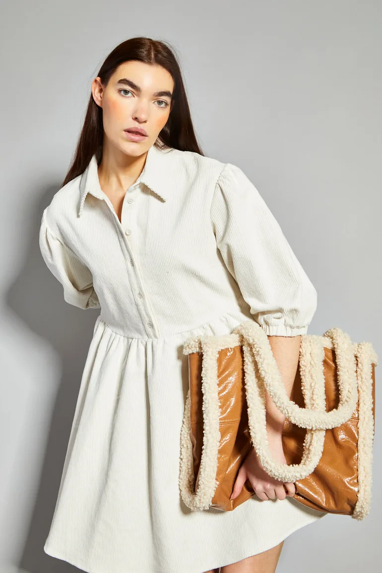 corduroy skater dress This season sees accent colours inspired by the natural landscape. Pair  signature neutrals like camel and cream with splashes of rust, ochre and  rich brown for the ultimate Autumn wardrobe. Shop the