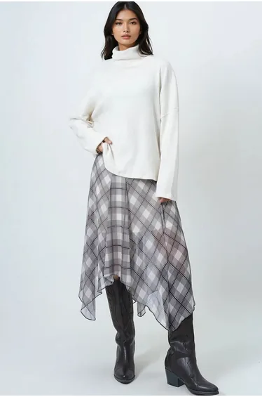 Women's ecru turtleneck wide cut knit blouse