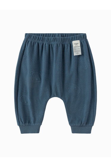 Unisex Textured Pants With Playful Back Detail
