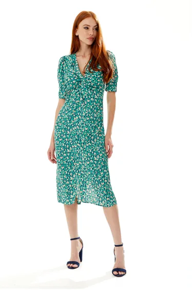 Women's Midi Wrap Dress with Short Sleeves and Daring Front Slit in Green .