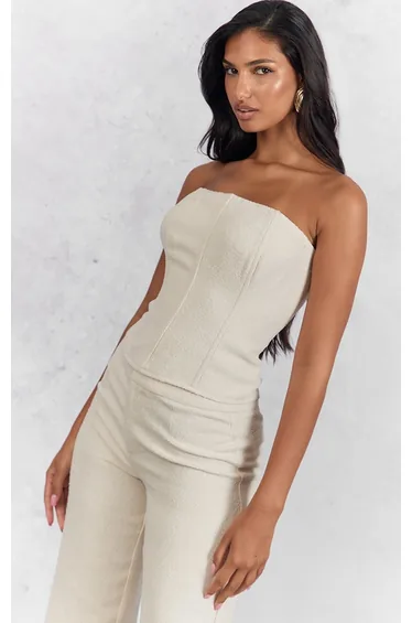 كورسية بريتي ليتل ثينق أبيض بلا أكمام سترابليس