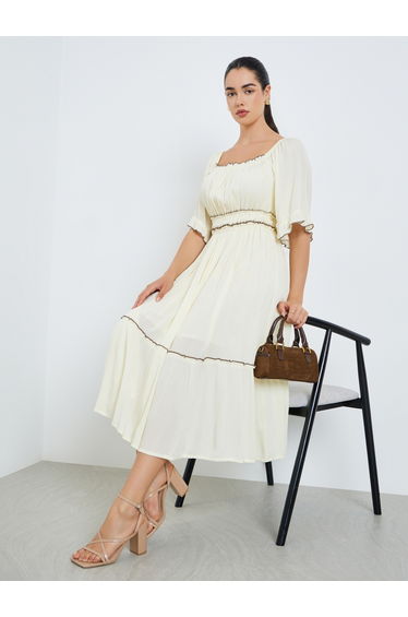 Women Cream Bell Sleeve Ruffled Hem Midi Dress
