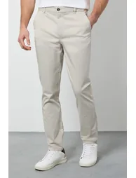 بنطلون تشينو بقصة ضيقة لون كريمي - 1