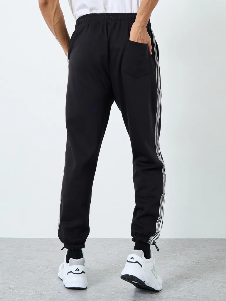 Men Black Graphic Oversized Joggers with Tape Detail - 3