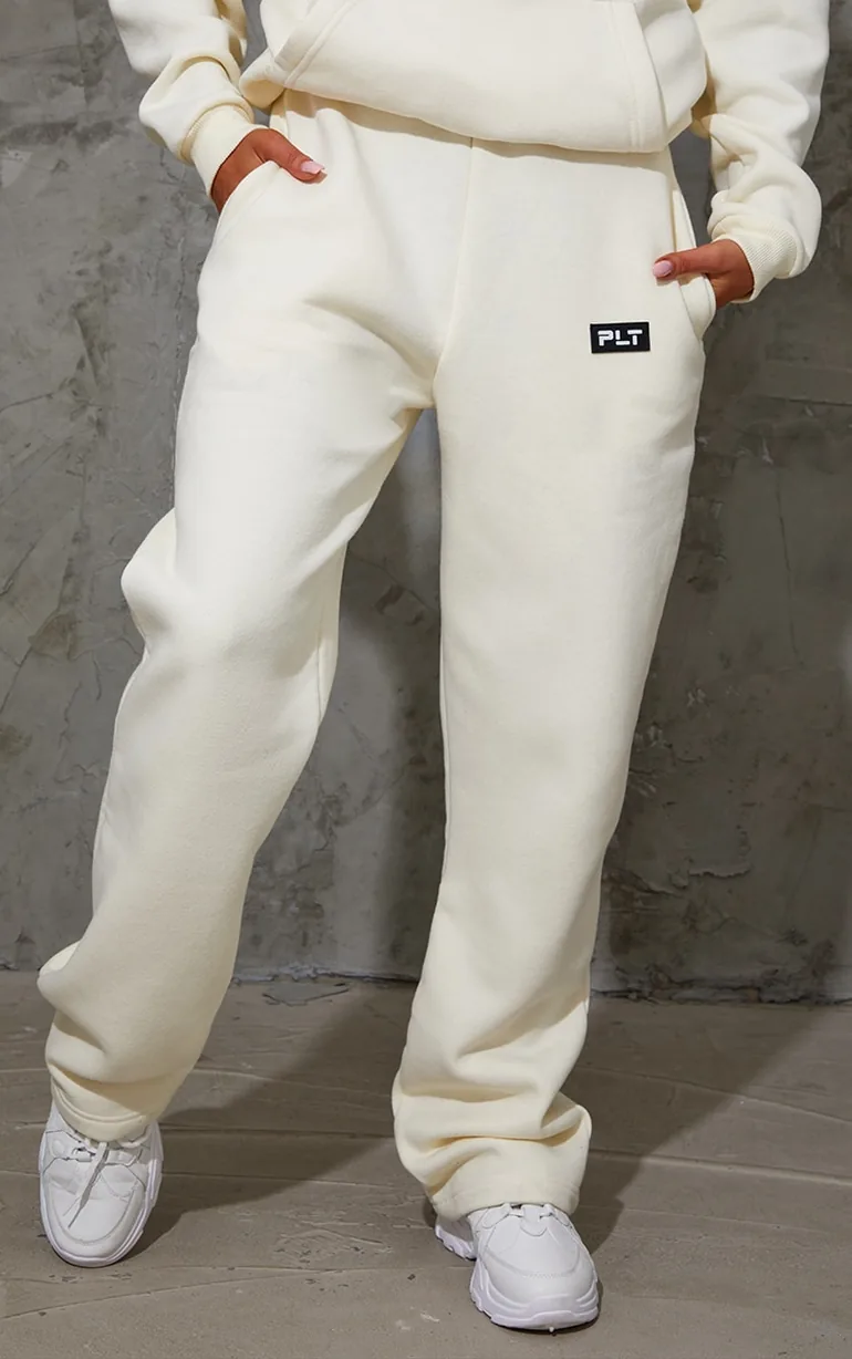 PRETTYLITTLETHING Recycled Cream Badge Detail Straight Leg Joggers - 1