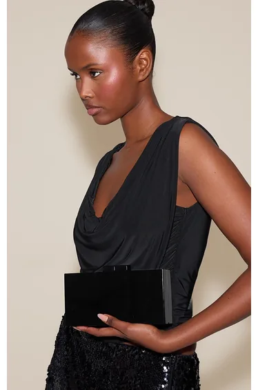 حقيبة كلتش بريتي ليتل ثينق باللون الأسود