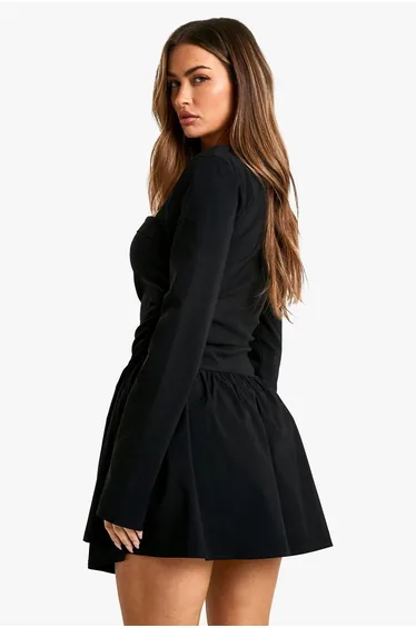 فستان قصير بأكمام طويلة لون أسود 
