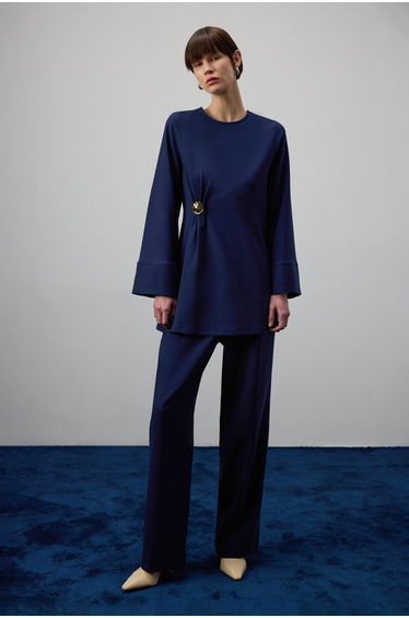 DRAPED BLOUSE WITH METAL ACCESSORY