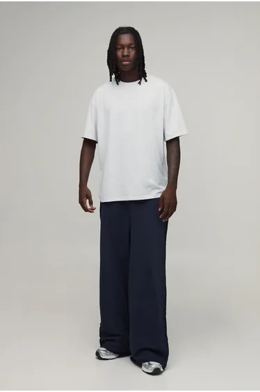 Extreme Wide Leg Loopback Embroidered Raw Hem Joggers - navy