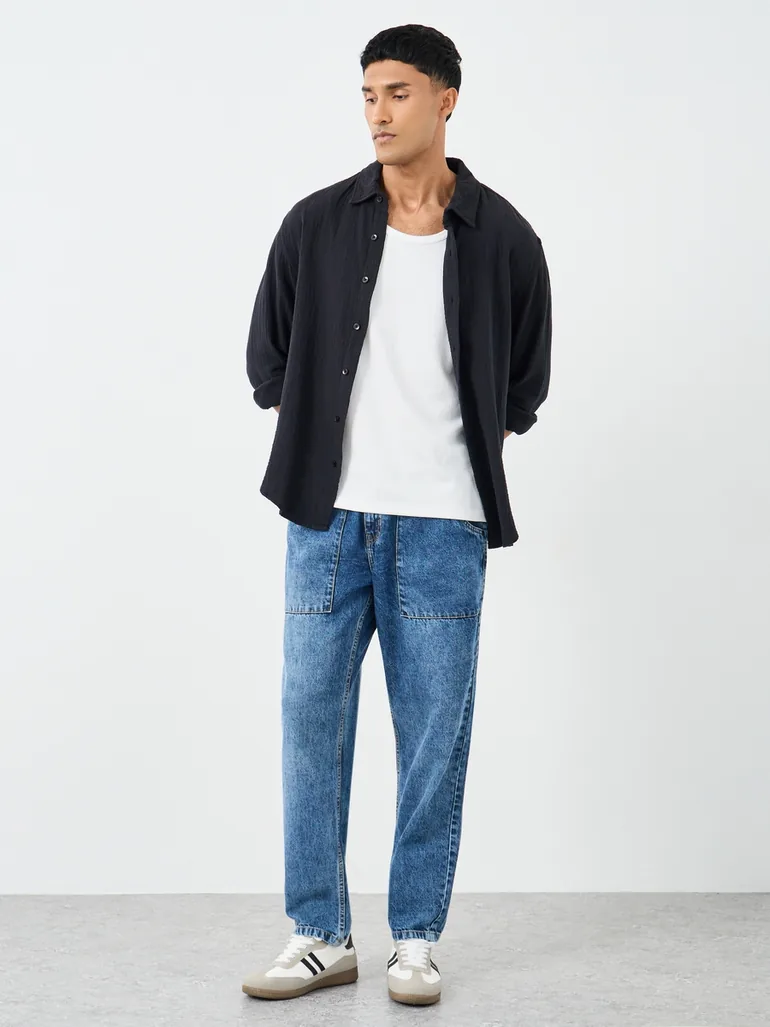 Mid Rise Washed Tapered Fit Jeans