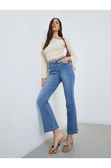 Mid Rise Boot Cut Faded Jeans