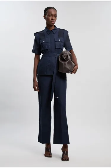 بلوزة قطن شفافة بجيوب