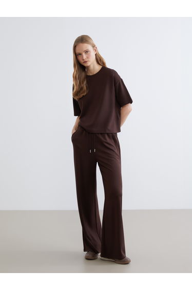 Effortless style meets ultimate comfort in our Soft Touch Oversized Tee.