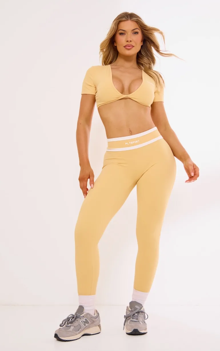 PLT SPORT Peach Sculpt Twist Front Contrast Detail Open Back Crop Top - 2