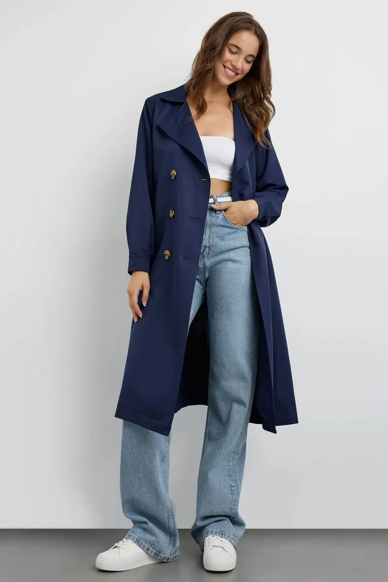 Buttoned Light Trenchcoat with a Belt - 1