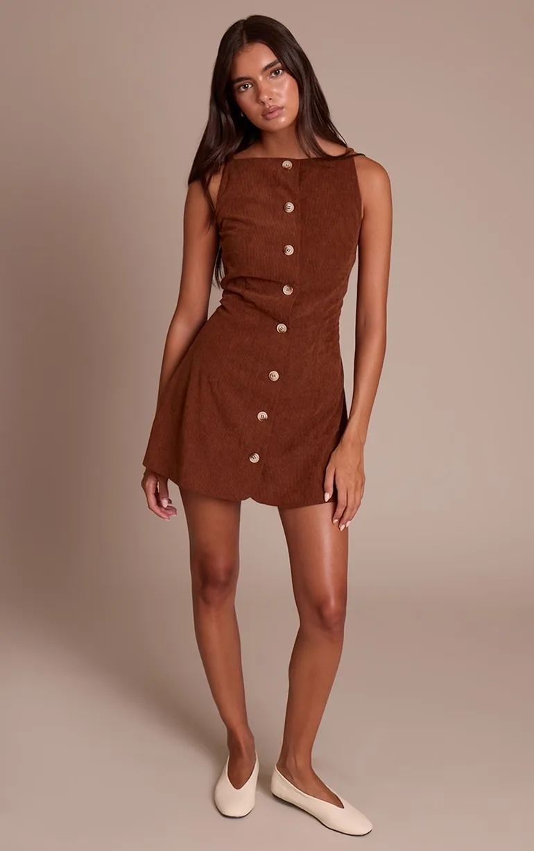 chocolate brown shift dress Premium leather, elevated details and a sophisticated chocolate brown hue introducing our Leather Shift Dress. #thisiswhistles