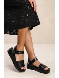 PHOENIX CLASSIC FLAT SANDALS WITH STRAP AND BUCKLE DETAIL IN BLACK FAUX LEATHER