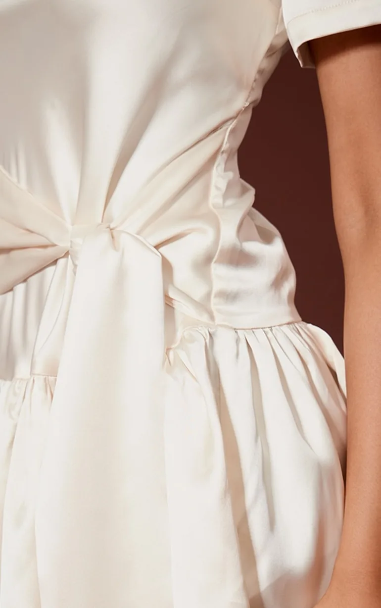 sachin and babi light blue dress Zimmermann Silk Wrap Minidress - Champagne main image 0