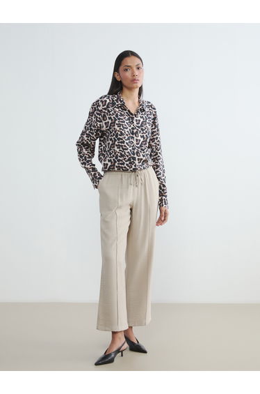 Women's Loose Fit Pleated Trousers