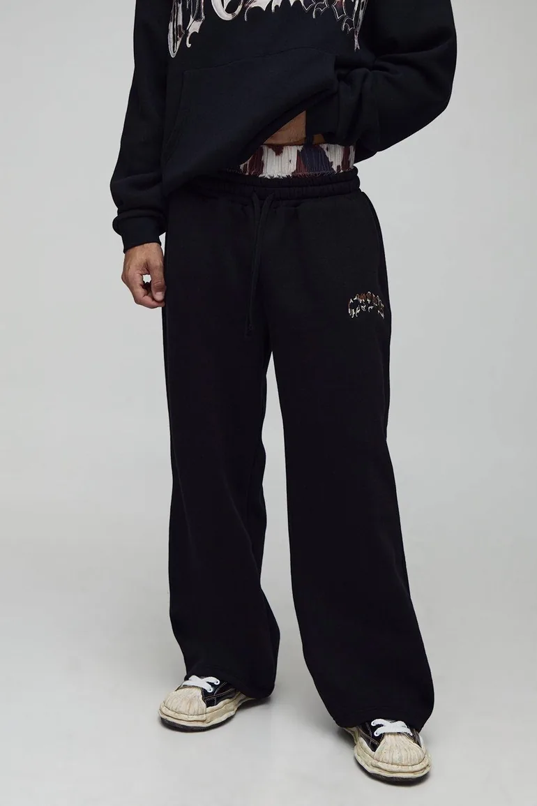 Wide Leg Ofcl Cow Applique Faux Waistband Joggers - black