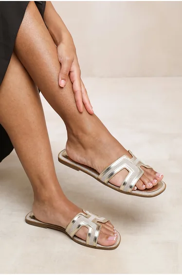 SURGE CUT OUT STRAP FLAT SANDALS IN GOLD METALLIC FAUX LEATHER