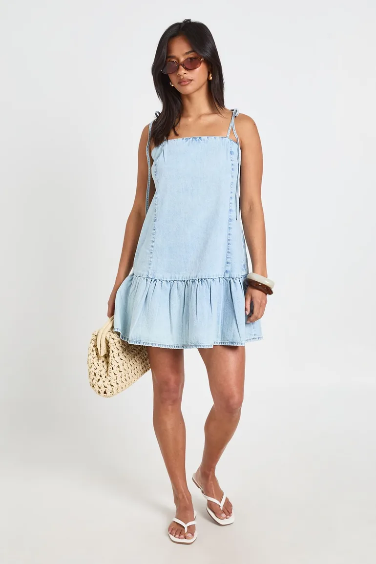 Petite Strappy Dropped Hem Denim Mini Dress - bleach wash