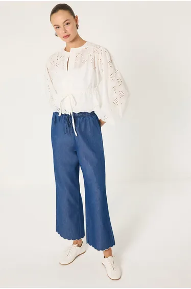 TROUSERS WITH EMBROIDERED HEM