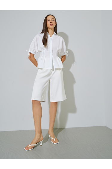 Short sleeve pleated peplum blouse with collar