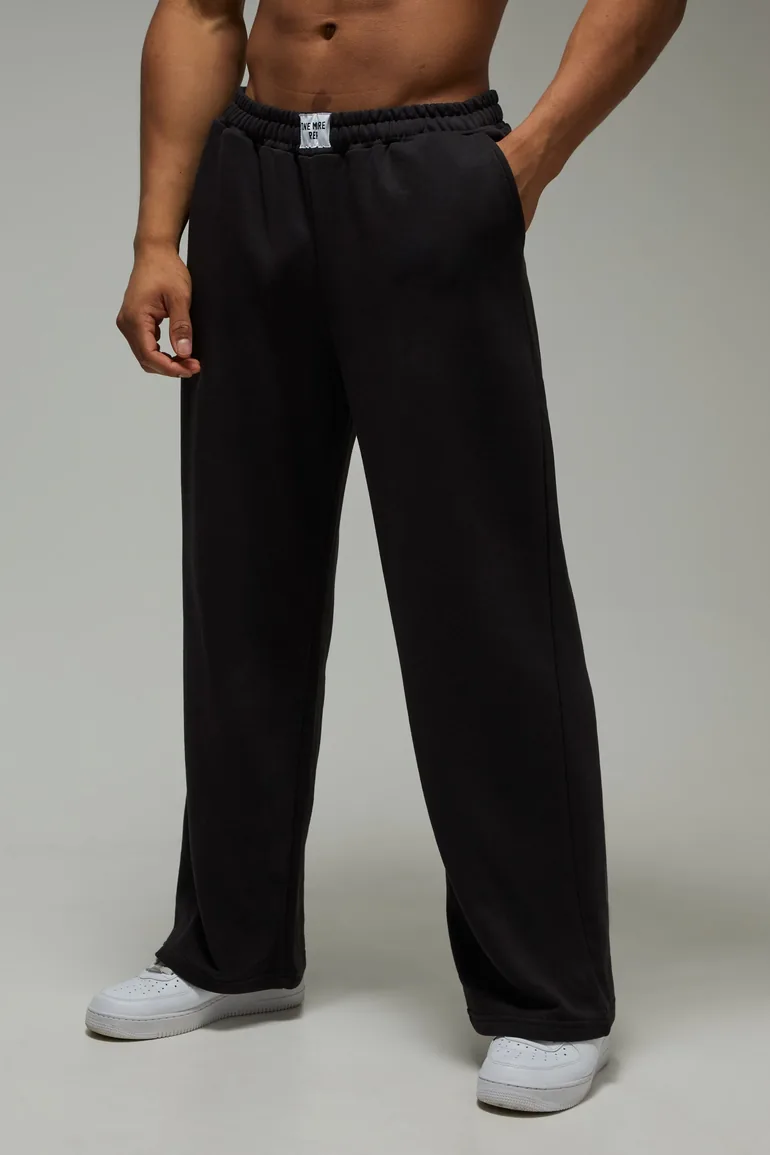 بنطلون رياضي بأرجل عريضة - أسود