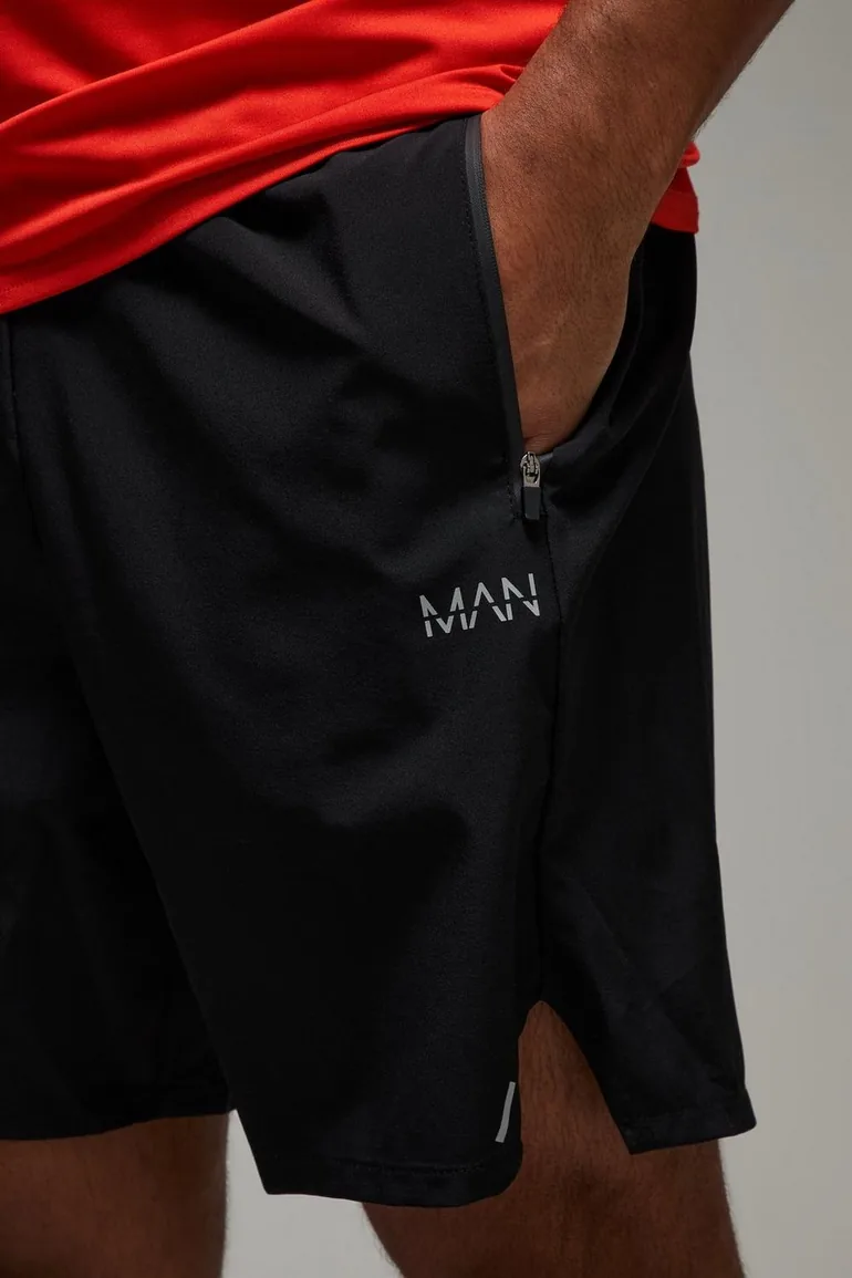Man Active Perforated Stretch Woven 7inch Shorts - black - 2