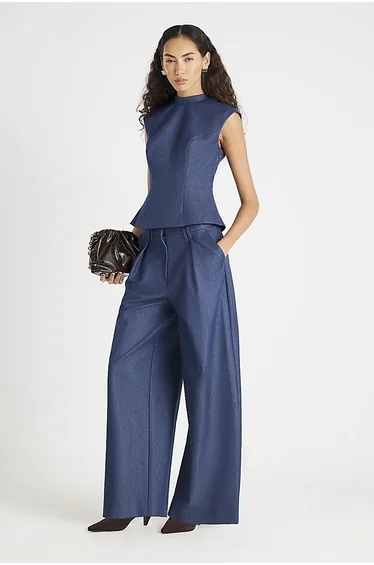 توب  جينز أزرق بلا أكمام