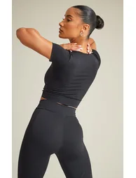 PRETTYLITTLETHING Black Sport Metal Badge Sculpt Short Sleeve Crop Top - 1