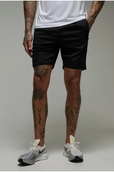 شورت رياضة إستريتش بجيوب بسحاب رياضي رجالي بشعار لون أسود - لطويل القامة