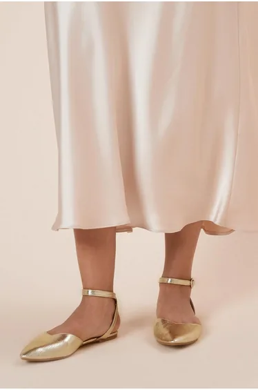 حذاء فلات دوروثي بيركينز باللون الذهبي