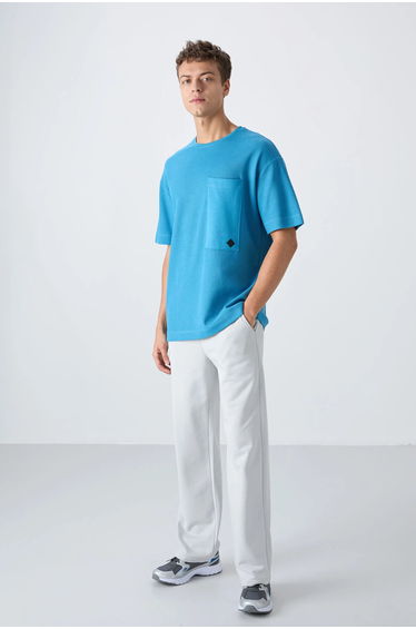 TOMMY Oversized Cotton-Blend Crew Neck T-Shirt With Pocket