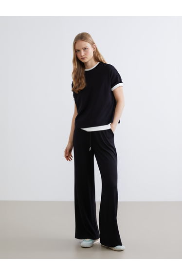 Effortless style meets ultimate comfort in our Soft Touch Oversized Tee.